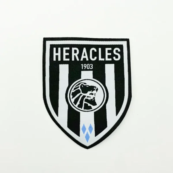 Iron on Woven Labels - Shield Shape with Full Knit Design