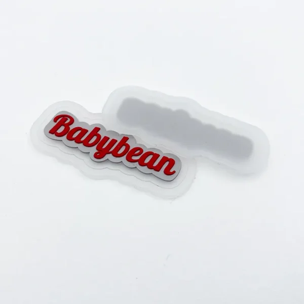 Custom PVC Patchs – Irregular Shape with Red Text on White Base - Image 3