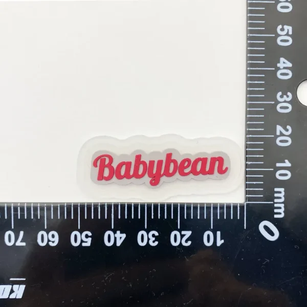 Custom PVC Patchs – Irregular Shape with Red Text on White Base - Image 4
