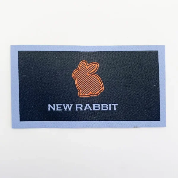 Woven Patch texture with Rabbit Design & Orange Text for Sweatshirts