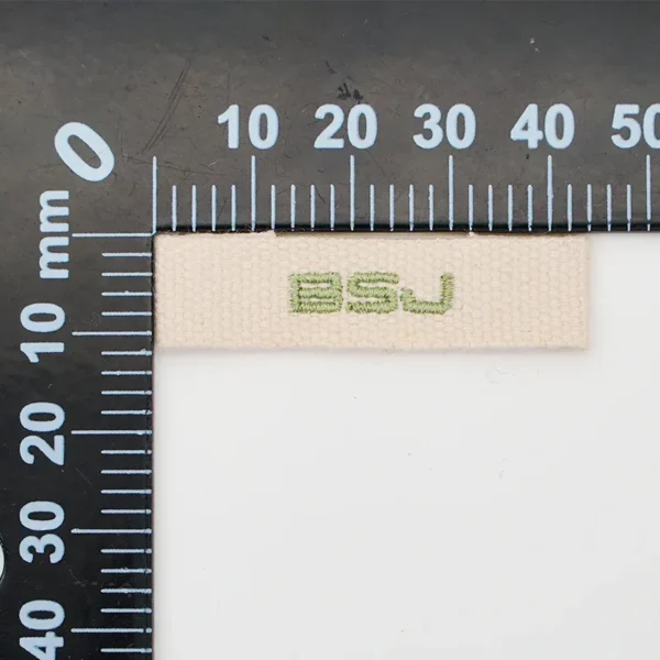 Small Beige Embroider Patch – Green “BSJ” Label - Image 4