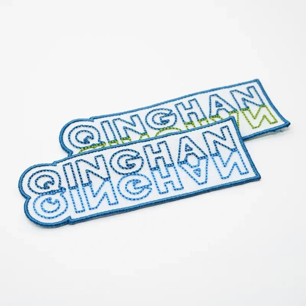 Embroidered Hat Patches – Blue and Green Text Stripes - Image 3