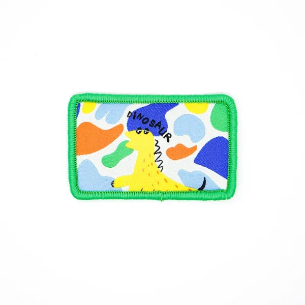 Cartoon Dinosaur Patch for Backpacks – Colorful Camo Design