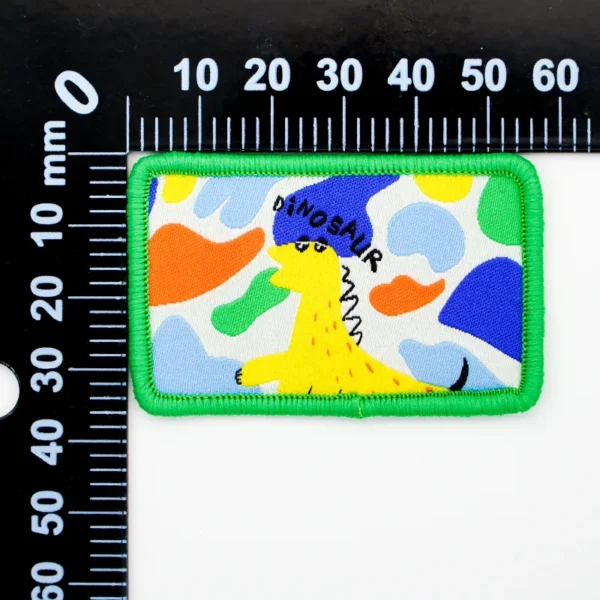 Cartoon Dinosaur Patch for Backpacks – Colorful Camo Design - Imagem 4