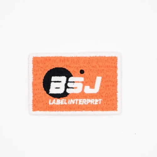 Patch personalizzate ricamate – Base arancione con pois neri