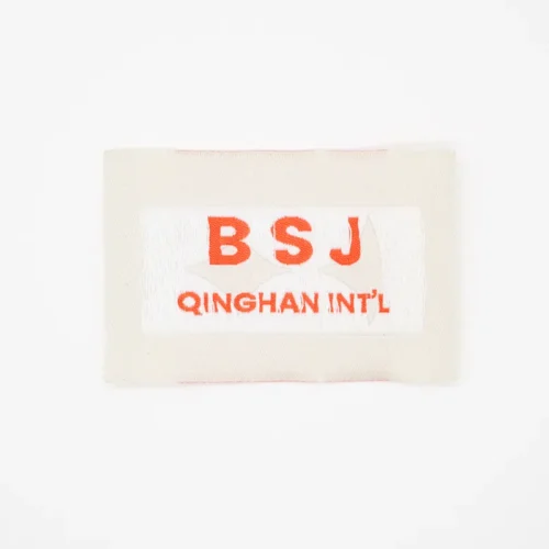 Étiquettes tissées personnalisées avec logo orange pour sacs à dos