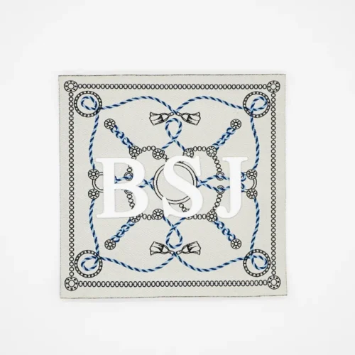 Étiquettes tissées de qualité à motif carré pour vêtements en cuir