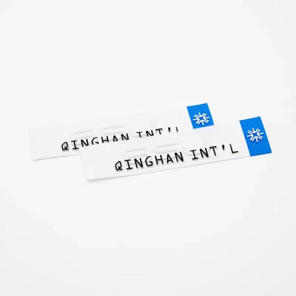 ⁦Custom Satin Woven Labels with Blue Logo and Black Text⁩ - الصورة ⁦3⁩