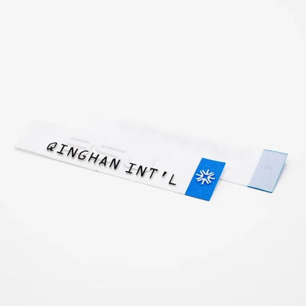 ⁦Custom Satin Woven Labels with Blue Logo and Black Text⁩ - الصورة ⁦2⁩