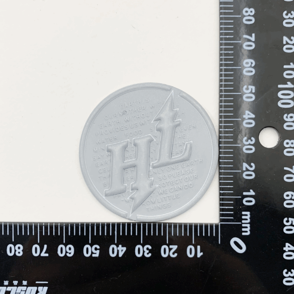 Silver TPU Plastic Patch – 3D Embossed “HL” Design - Image 4
