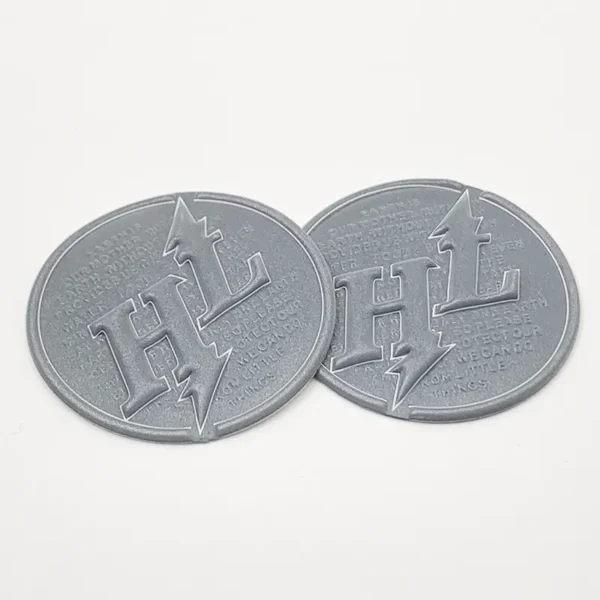 Silver TPU Plastic Patch – 3D Embossed “HL” Design - Image 3