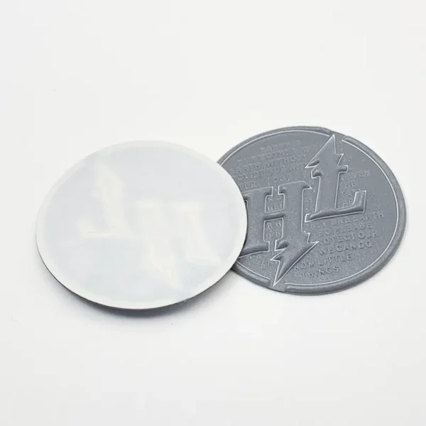 Silver TPU Plastic Patch – 3D Embossed “HL” Design - Image 2