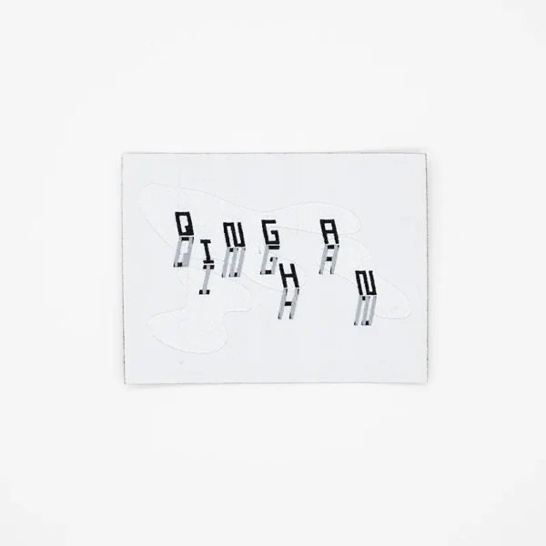 Woven Label Printing with Custom Black Art Design