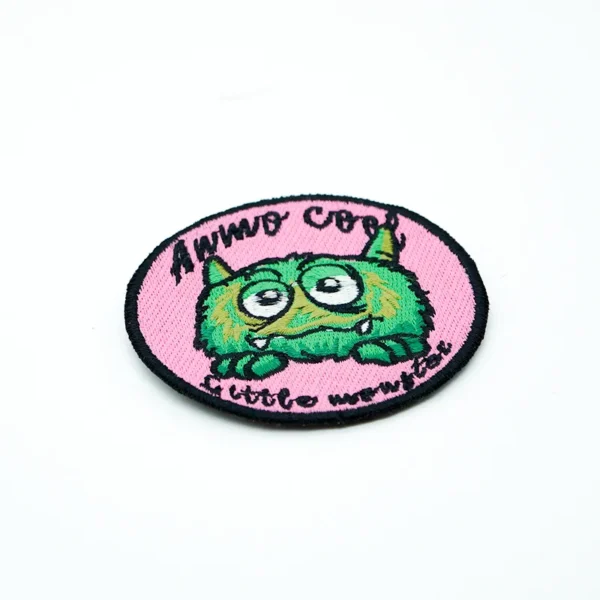 Cute Embroidered Patches – Green Monster with Pink Background - Imagen 3
